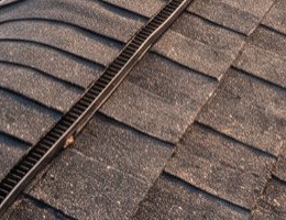 Roof ridge with cut three-tab used as ridge cap